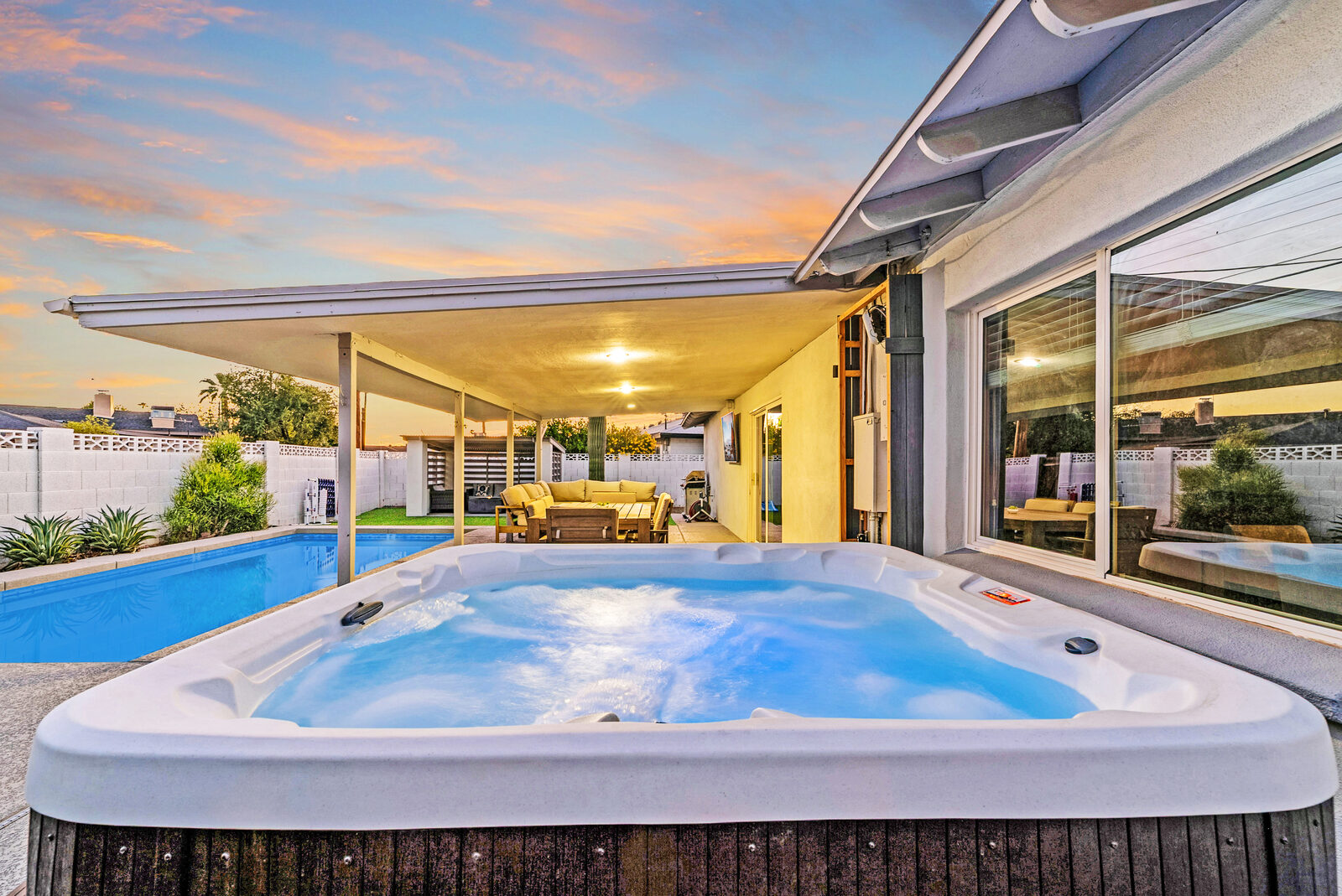 The pool and spa at Solace, a four-bedroom desert home with the McDowell ridgeline on the skyline.